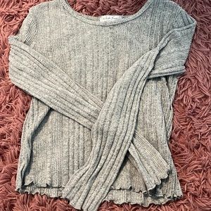 Grey long sleeve top. Size medium but runs small.